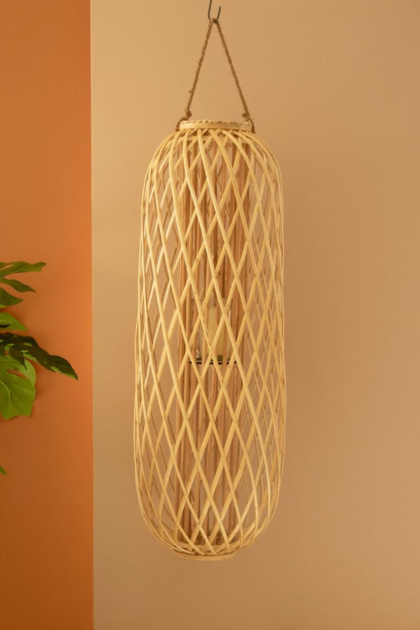 Tall oval natural willow floor lantern with glass insert