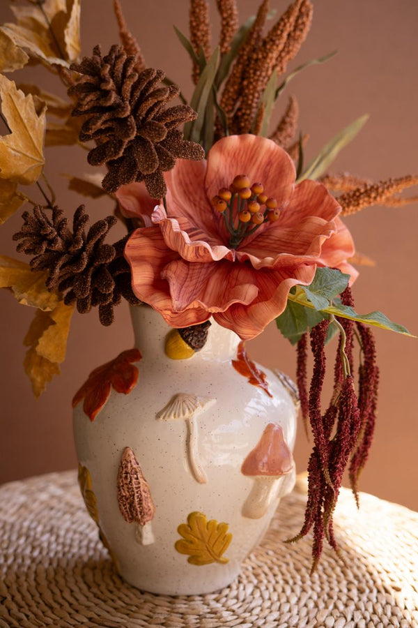 Ceramic vase with sculpted leaves and mushrooms in relief