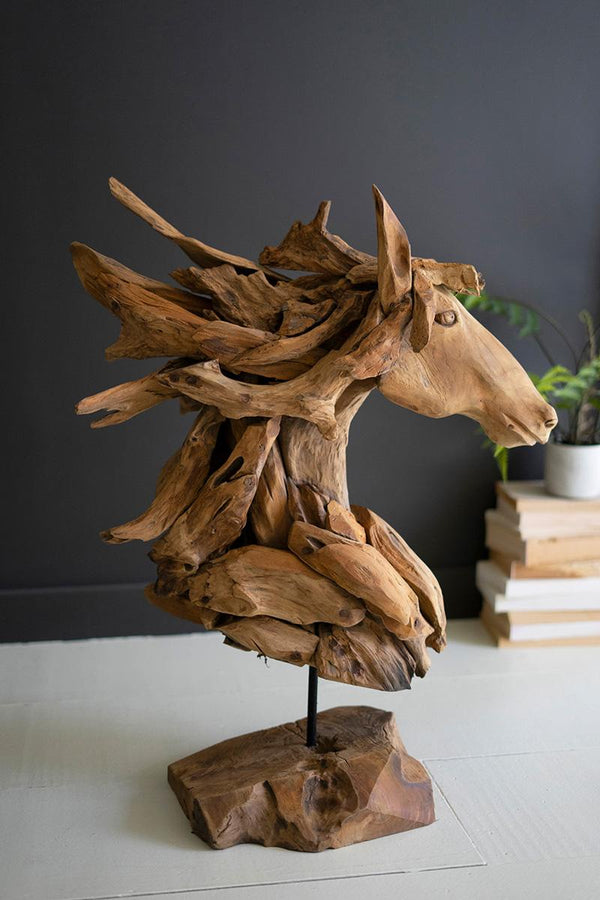 Carved teakwood horse head sculpture mounted on an iron base