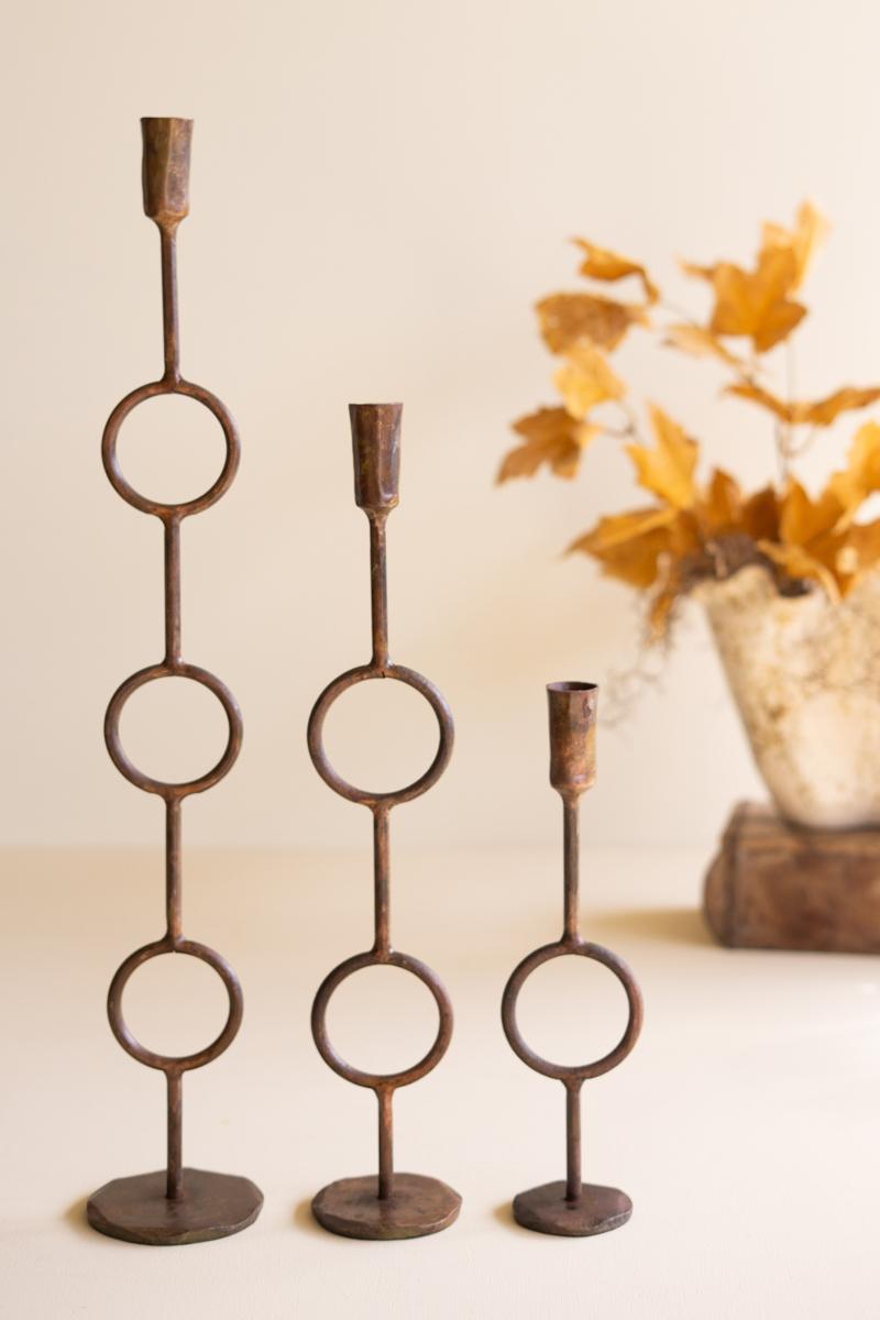 Brass taper holders styled