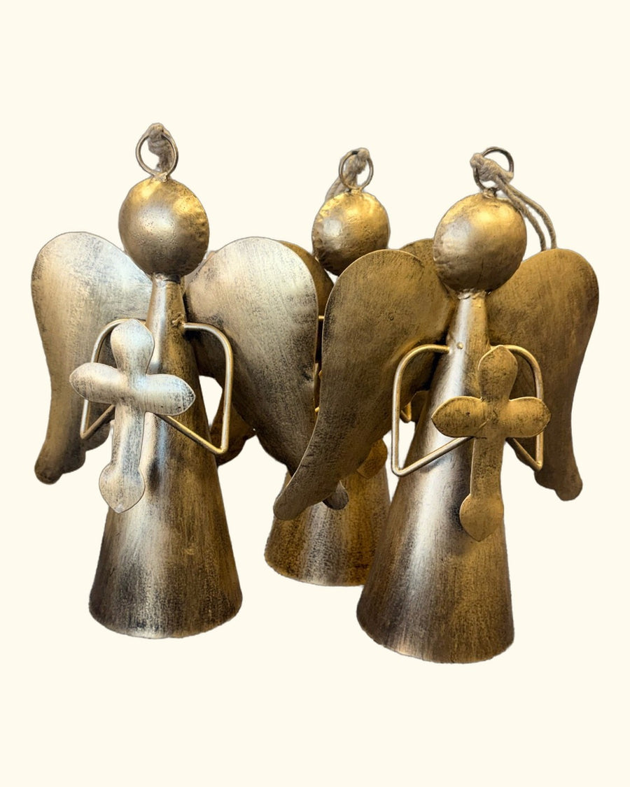 Gold angel holding a cross
