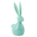 Turquoise ceramic rabbit figurine on a white background