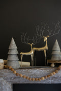 Gold metal nutcracker pair close-up