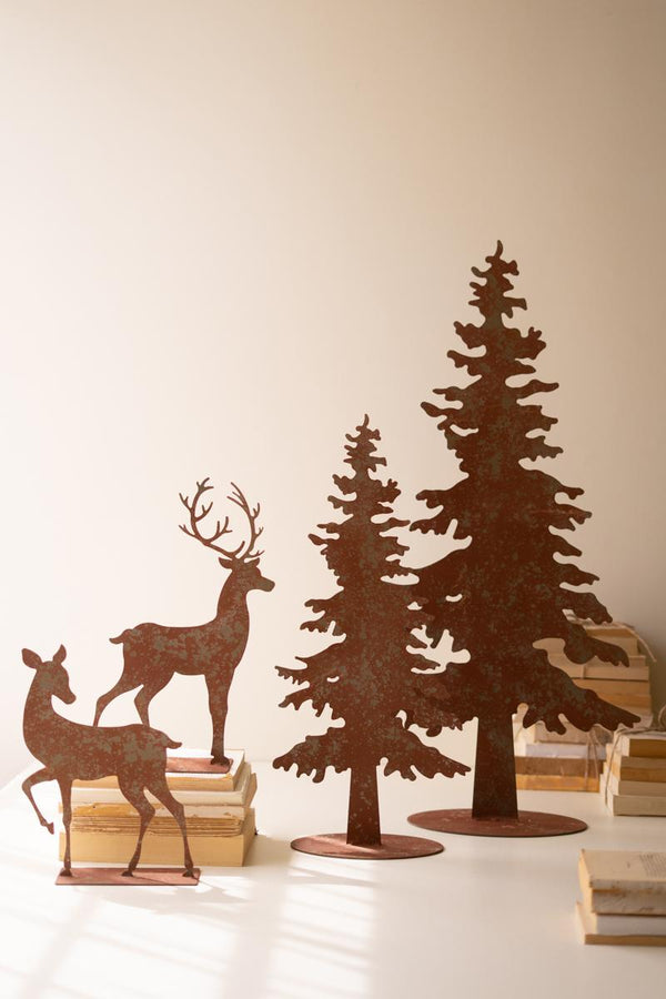 Set of four rustic acid-washed metal Christmas trees and reindeer