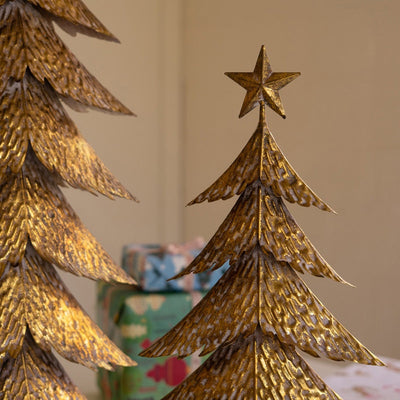 Gold metal Christmas trees detail view