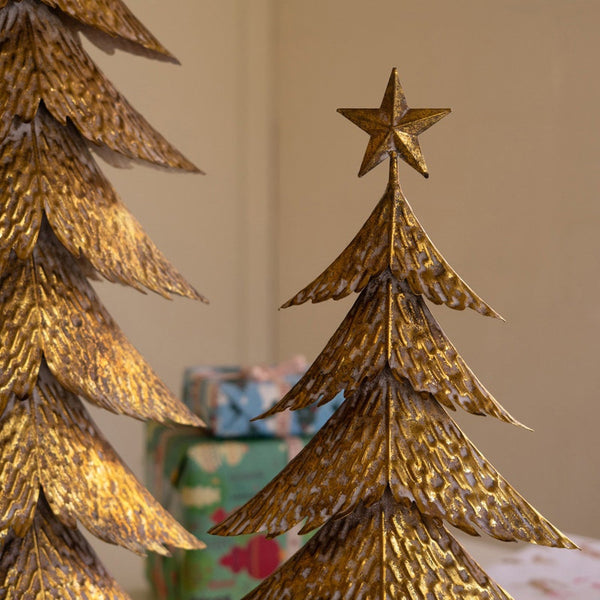 Gold metal Christmas trees detail view