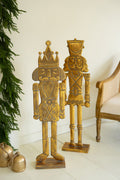 Gold metal nutcracker detail view holiday accent