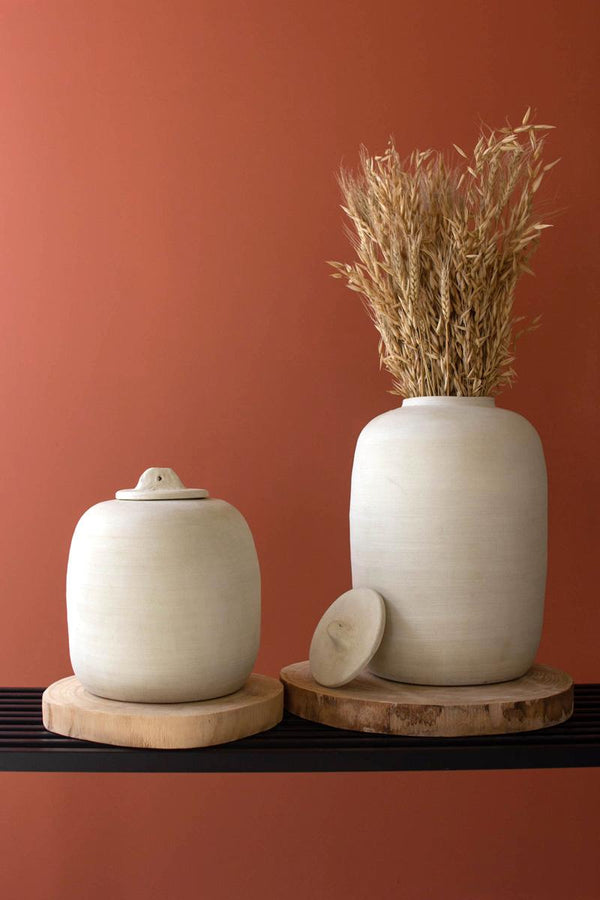 Set of two off-white matte ceramic canisters with lids
