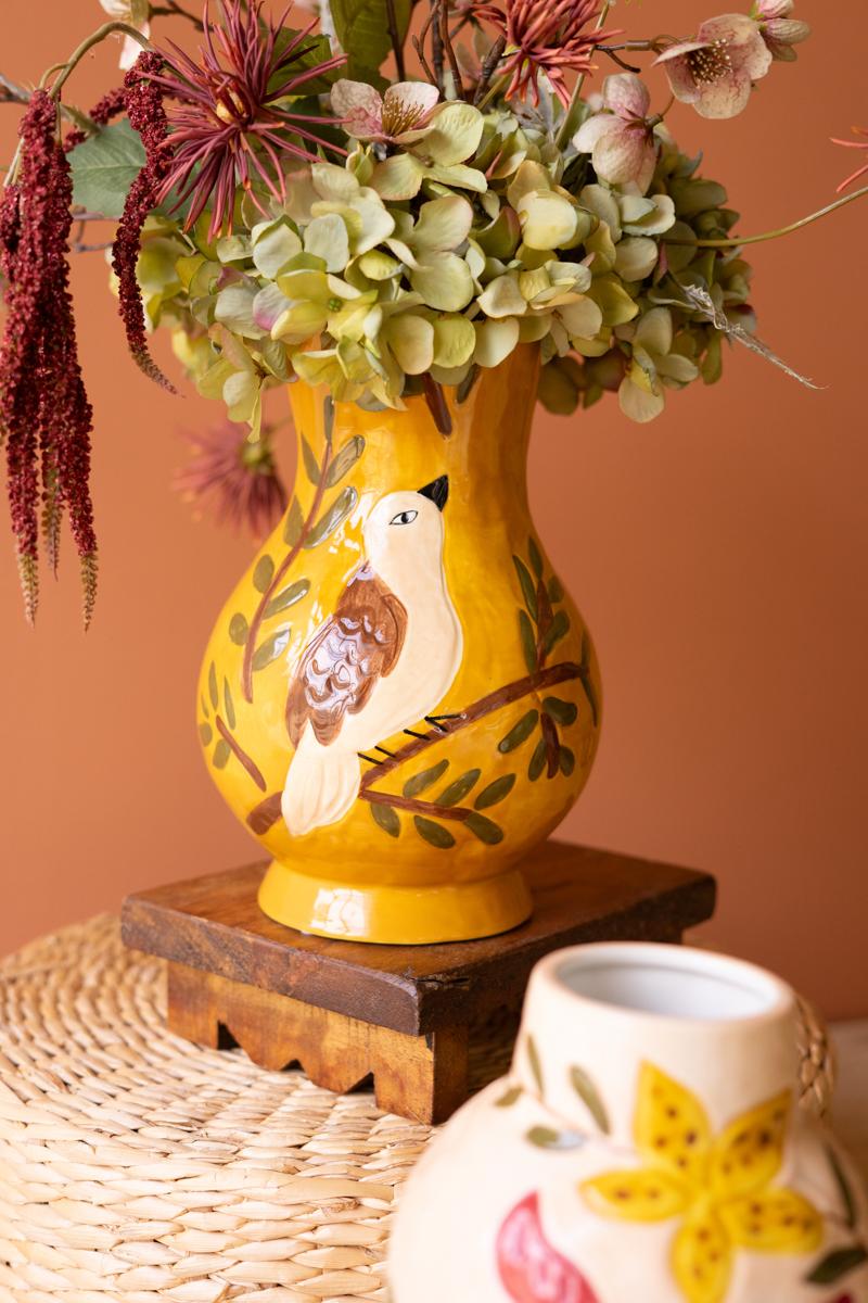 Bird vases styled with flowers