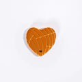 Heart-shaped salmon on a white background