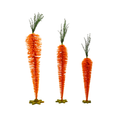 Three decorative carrots made of orange pipe cleaners on a white background