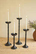 Cast aluminum candle holders close-up