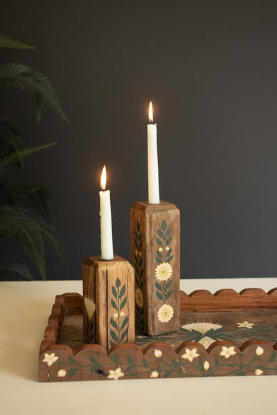 Taper candle holders with candles