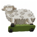 Decorative sheep figurine with a smiling face on a white background