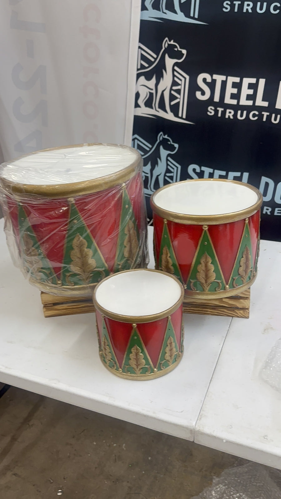 Nesting drum containers stacked