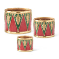 Red, green and gold nesting drum risers set of 3 on white background