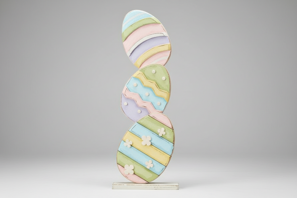 Decorative item with pastel-colored stripes on a gray background