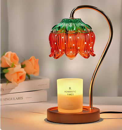 Strawberry Candle Warmer Lamp with a glass strawberry shade and wood base, warming a candle