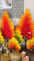 Triple Fall Trees styled on a console at home